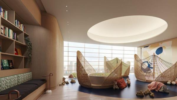Artist’s perspective of a child-friendly indoor playroom with cocoon seats, bookshelves, toys, and climbing features