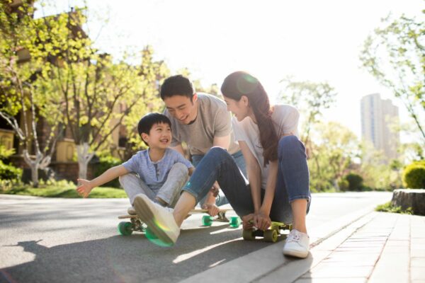 Family enjoying time together outdoors, showing the lifestyle benefits of living near multiple city routes