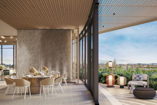 Elegant dining and outdoor lounge area at Haraya Residences with city views