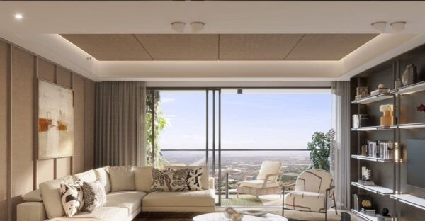 Artist’s perspective of a modern condominium living room with minimalist furnishings, built-in shelving, and a balcony overlooking the city