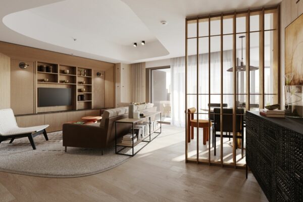 Open-plan living and dining area with a decorative partition creating separation while preserving natural light and spaciousness