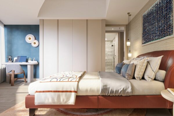Flexible bedroom with a large bed, built-in storage, and a dedicated study area for changing family needs
